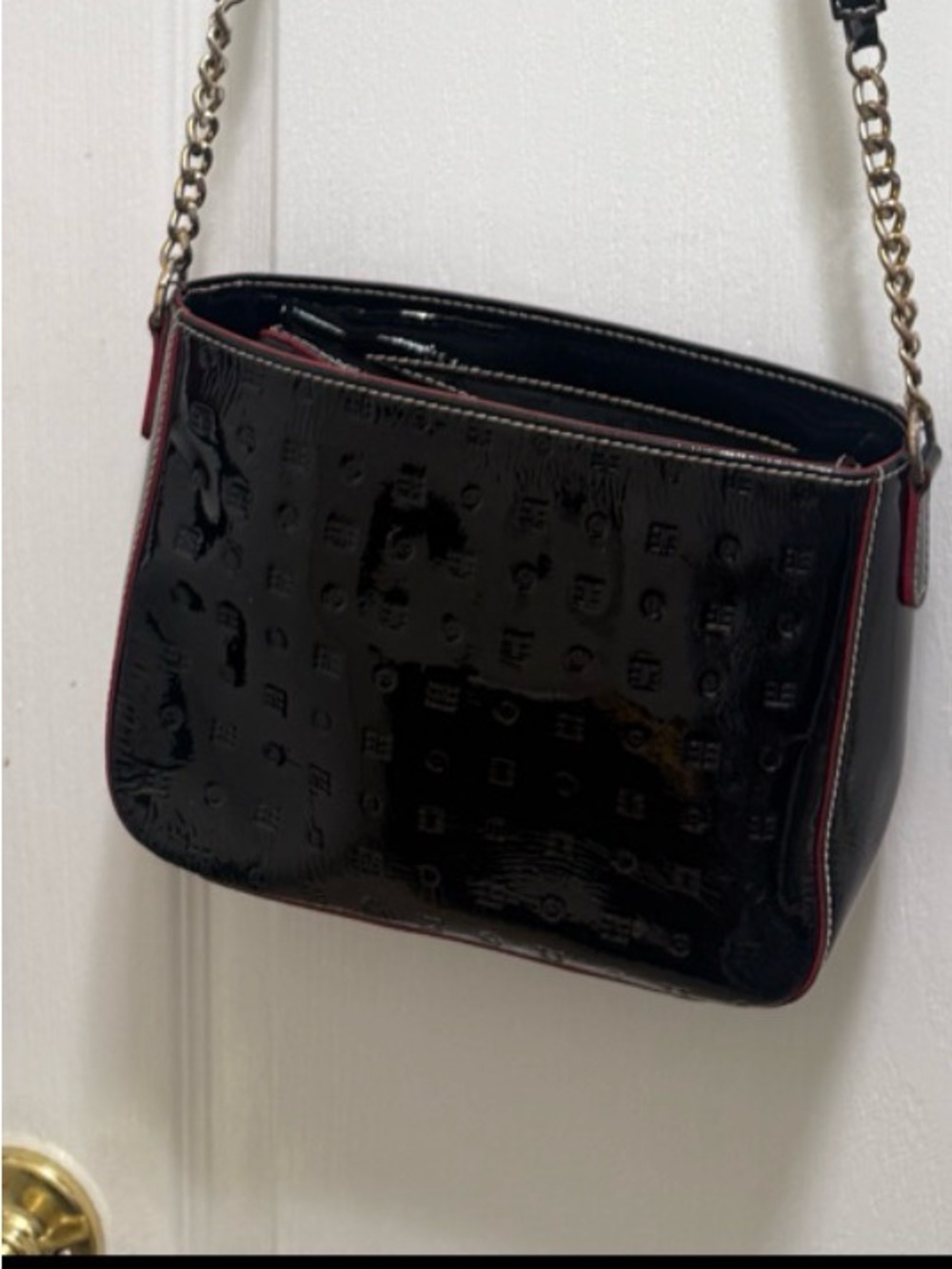 Arcadia Black Patent Crossbody with Red. embossed design